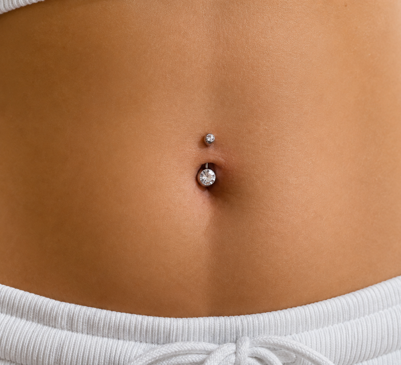 Piercing ombligo circón clear
